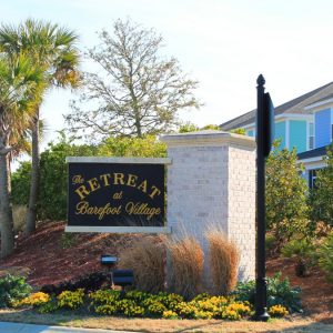 Sign for the Retreat at Barefoot Village