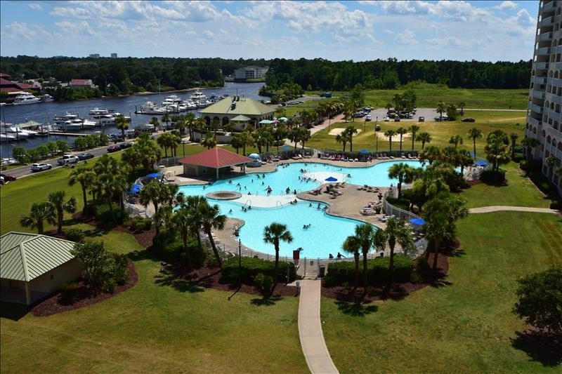 View of pool and water by condos.