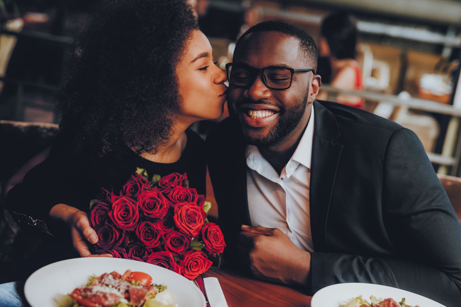 Couple having Valentine's Day dinner in restaurant.