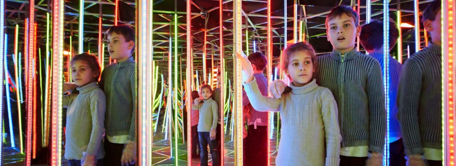 Kids in mirror maze