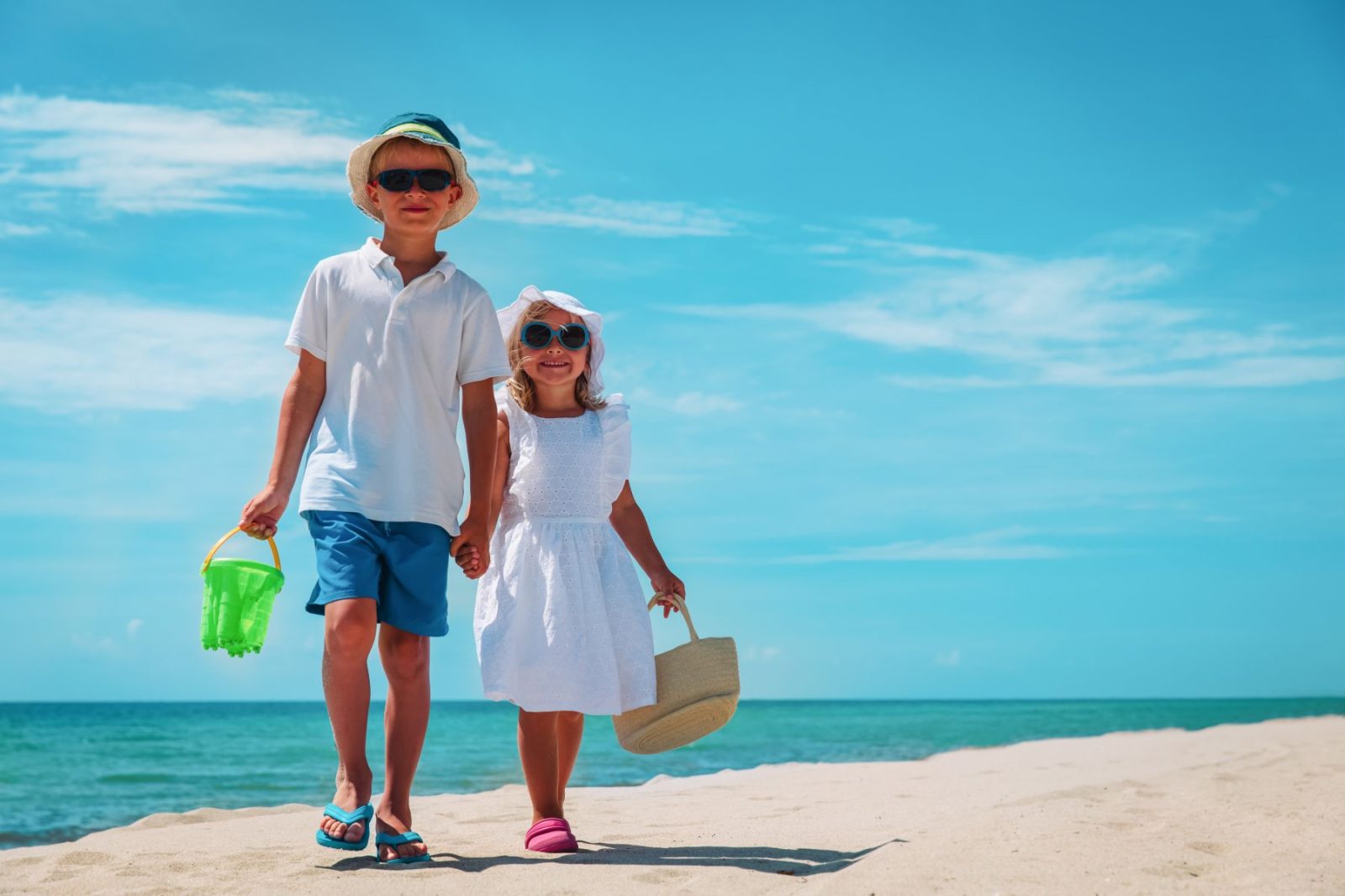 Kids walking on the beach